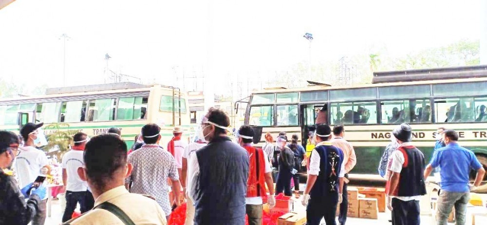 Volunteers from different civil societies and NGOs assisting health workers and other state officials on duty at the Railway Station, Dimapur as returnees arrive to Nagaland during the first wave of COVID-19 pandemic. (Morung File Photo)